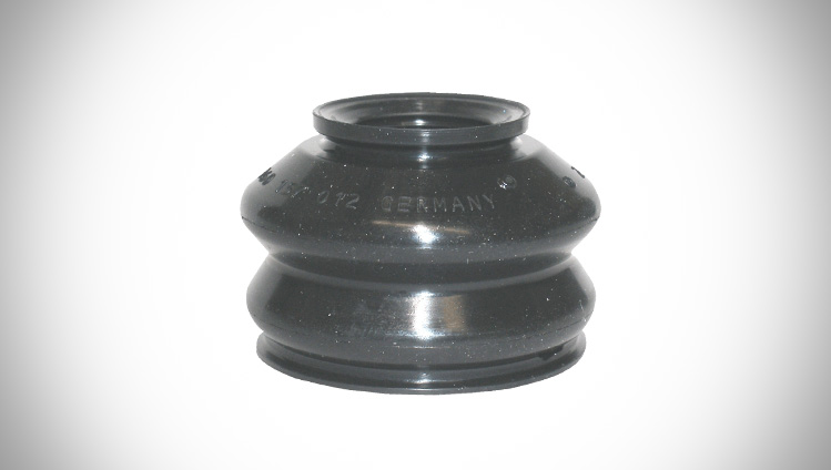 Sealing boot incl. metal insert